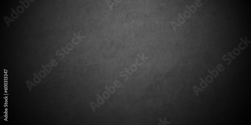 Natural dark black old wall smooth plaster grunge concrete backdrop background. abstract concrete black texture, vintage grunge wall crack old backdrop background. 
