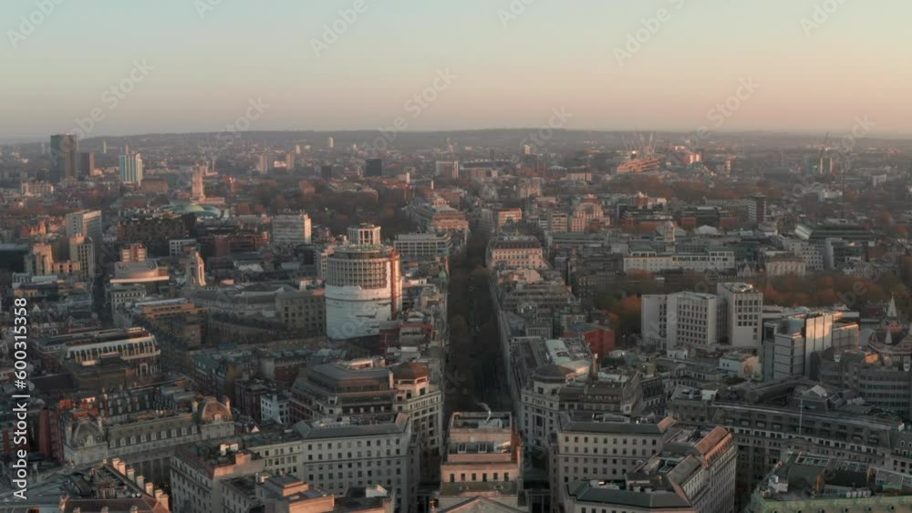 Dolly back aerial shot over Kingsway the strand London at sunrise Dolly back aerial shot over Kingsway the strand London at sunrise
