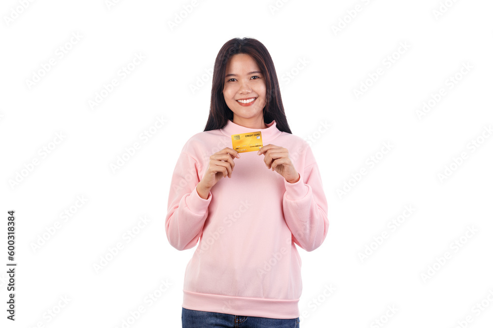 Young Asian woman smiling showing credit card isolated on white background, making payment, paying online business Young Asian woman smiling showing credit card isolated on white background, making payment, paying online business