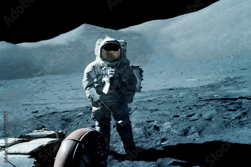 Astronaut on a lunar rover  on the moon. Elements of this image furnishing NASA.