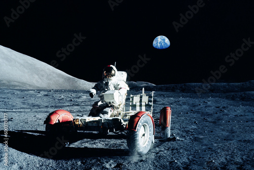 Astronaut on a lunar rover, on the moon. Elements of this image furnishing NASA.