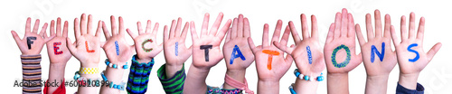 Children Hands Building Word Felicitations, Isolated Background photo