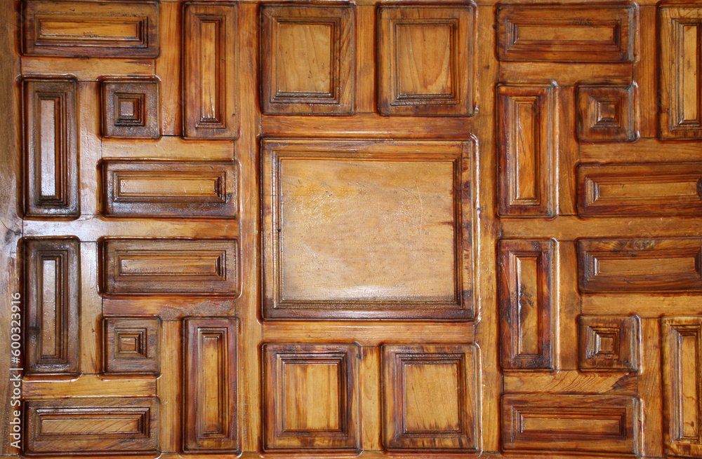 Obraz premium Detail of medieval window shutter with square elements and beautiful wooden texture