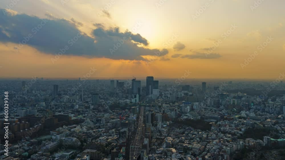 Sunset timelapse at Tokyo Shibuya urban city view with express way light trails in Japan. Sunset timelapse at Tokyo Shibuya urban city view with express way light trails in Japan.