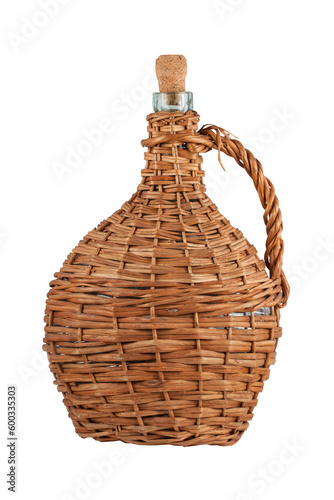 Glass round flattened bottle with wicker braid and wicker braided handle. On transparent background.