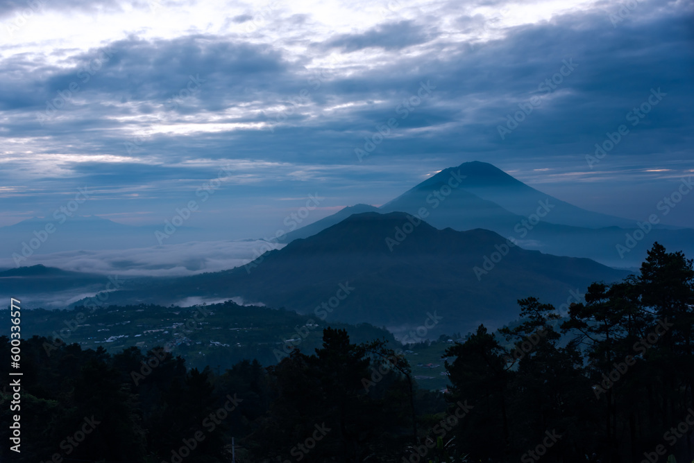 Mountain landscape on Bali, Indonesia. Volcanos Batur and Agung on sunrise Mountain landscape on Bali, Indonesia. Volcanos Batur and Agung on sunrise