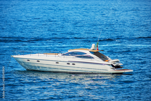 White luxury motor boat moored in the Mediterranean Sea, Gulf of La Spezia, Liguria, Italy, southern Europe. © Alberto Masnovo