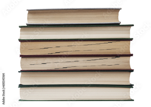 Books stacked on top of each other. Fore edges. Isolated on a white background.