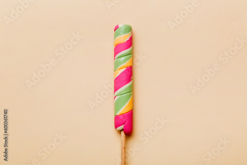 Colorful candies, lollypop on the colorful background, multicolored minimal style top view © sosiukin