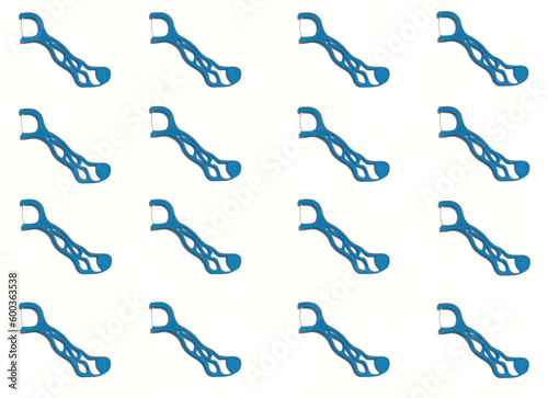 Seamless pattern blue dental floss picks on white color background, top view. Healthy teeth.