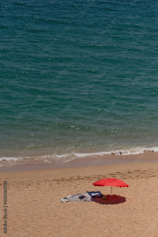 Sandy beach umbrella sea coast sunny day