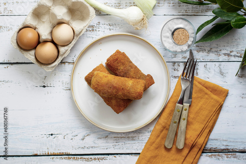 Polish traditional vegetarian krokiety snack served for breakfast. Croquet are filled with meet, fried in oil, and served as an appetizer, side dish, or dinner