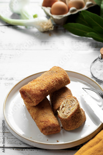 Polish traditional vegetarian krokiety snack served for breakfast. Croquet are filled with meet, fried in oil, and served as an appetizer, side dish, or dinner