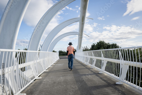 People walking on Te Rewa Rewa bridge. New Plymouth.