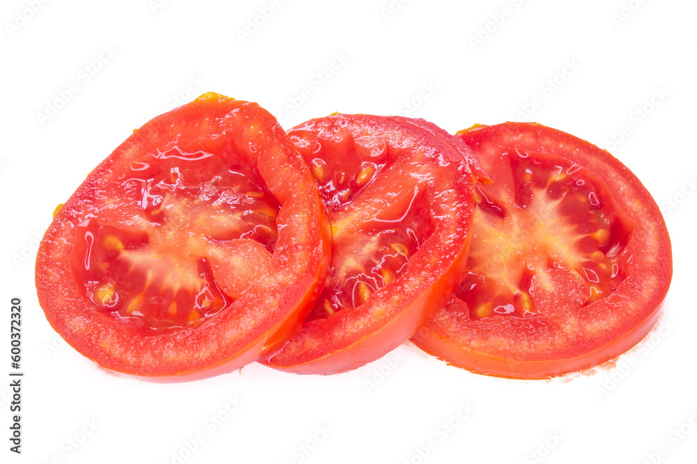 Slice of tomatoes isolated on white background. Top view, flat lay. Slice of tomatoes isolated on white background. Top view, flat lay.