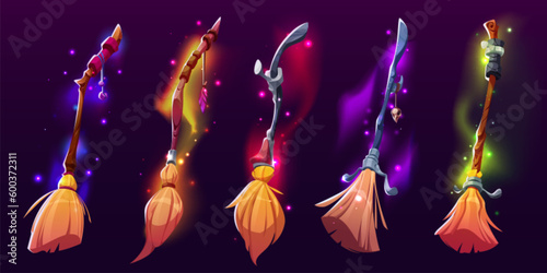Set of vector magic witch broom clipart for fantasy game cartoon illustration. Halloween wizard stick with vibrant shimmer and blur effect. Isolated witchcraft item with sparkle and luminosity. photo