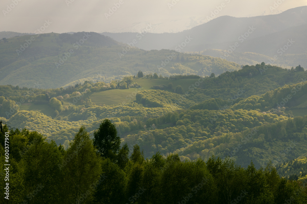 Scenic view of nature landscape over the hills and mountains in Poiana Marului, Brasov County, Romania.