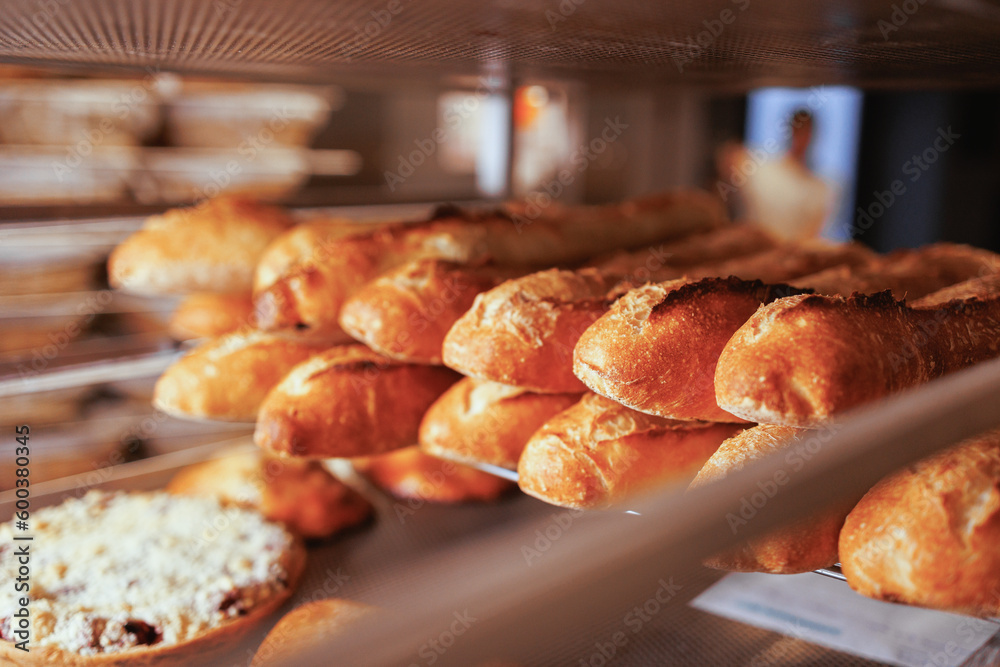Organic Bakery - details of baker baking bread Organic Bakery - details of baker baking bread