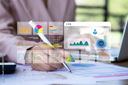 Accounting and Financial concept. Investors working on desk office and use computer keyboard and laptop to check data cost, balance, projit and currency.