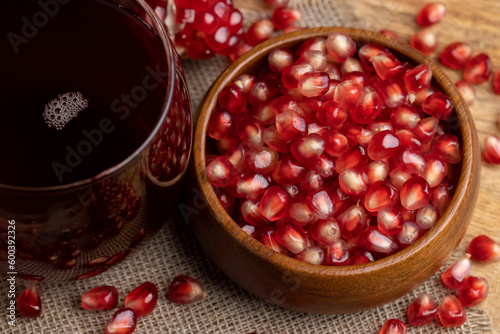 Sweet and sour pomegranate juice in a transparent glass