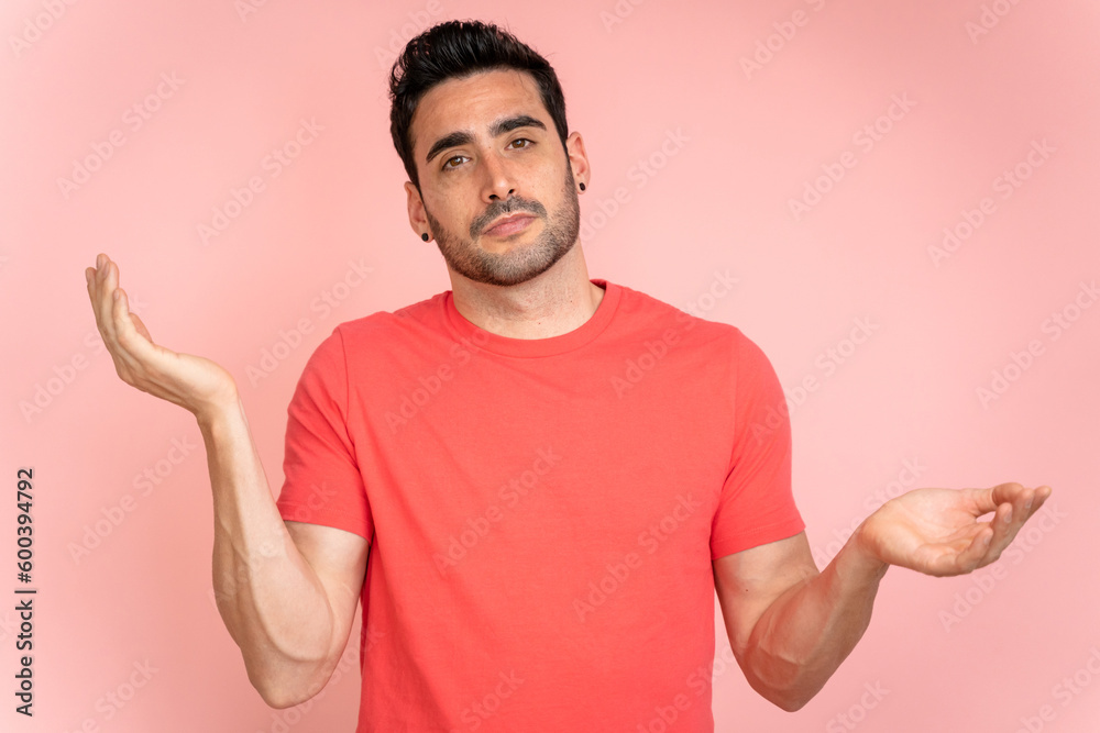 Doubtful man in a studio shot. Doubtful man in a studio shot.