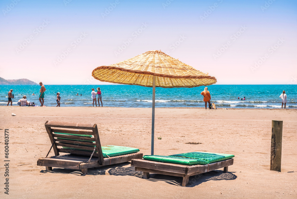 Sunbeds and umbrellas on Iztuzu Beach, Turtle Beach, Dalyan River, Mediterranean Sea, Marmaris, Turkey