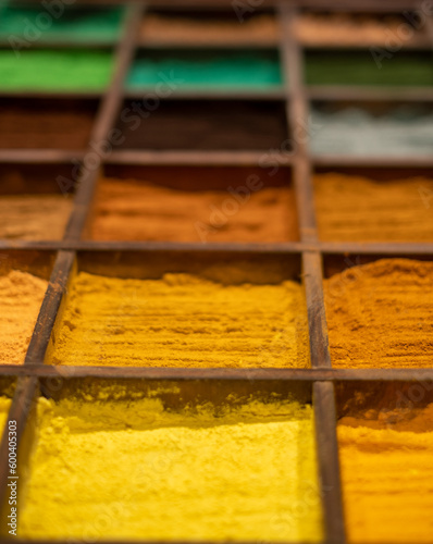 colorful poudre for painters in wooden support