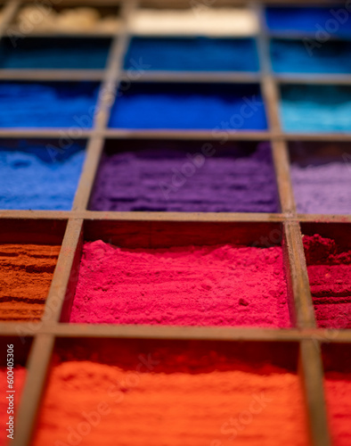 colorful poudre for painters in wooden support