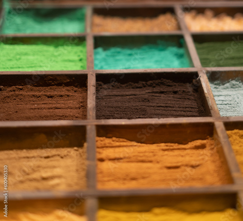 colorful poudre for painters in wooden support