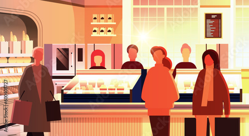 mix race people group standing in modern bakery with fresh pastries sweets cakes and bread horizontal