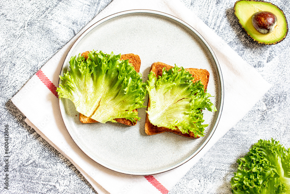 Step 10. Stepbystep preparation of a sandwich with tuna, avocado