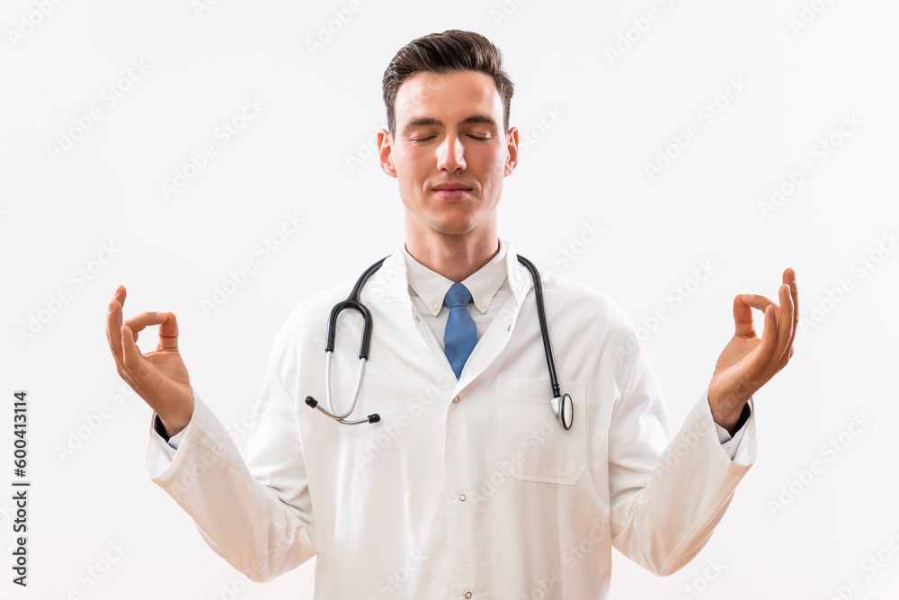 Portrait of young doctor meditating. Portrait of young doctor meditating.