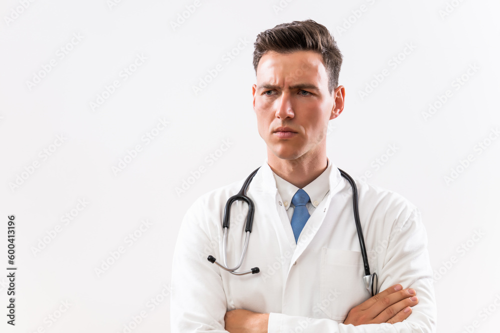 Portrait of young angry doctor thinking. Portrait of young angry doctor thinking.