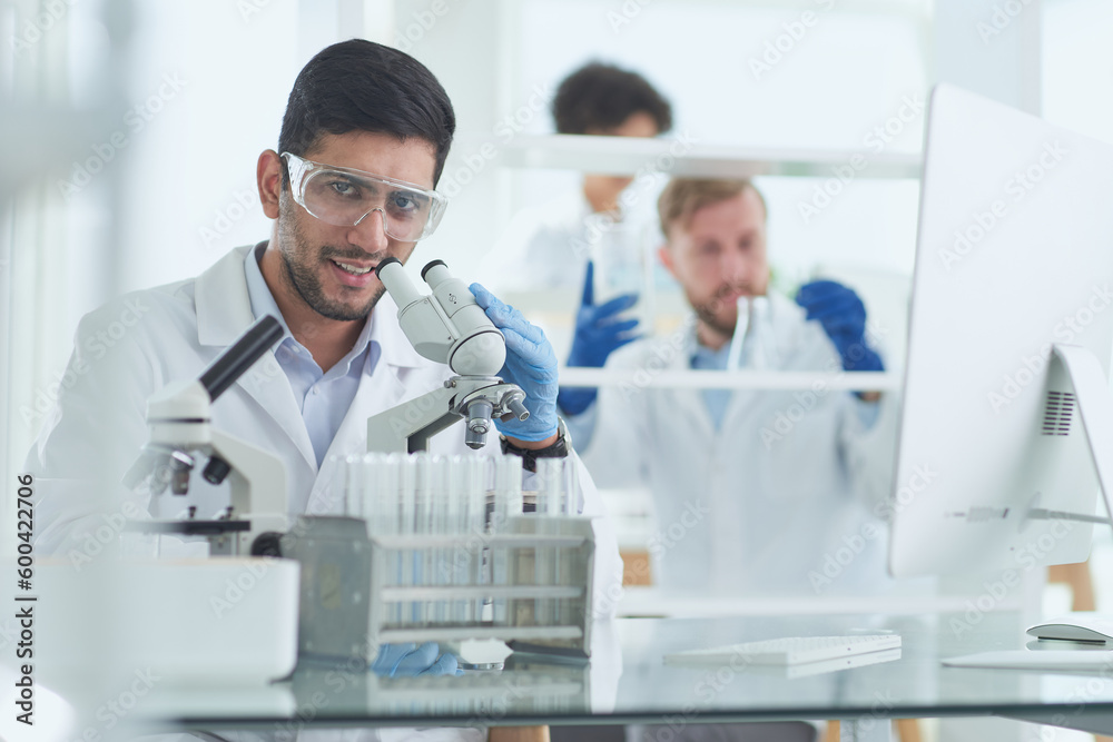 In a Modern Laboratory Research Scientist Conducts Experiments In a Modern Laboratory Research Scientist Conducts Experiments