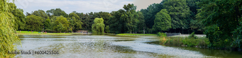 Panoramic view of lake in the park Slottsparken in Malmö Sweden during summer photo