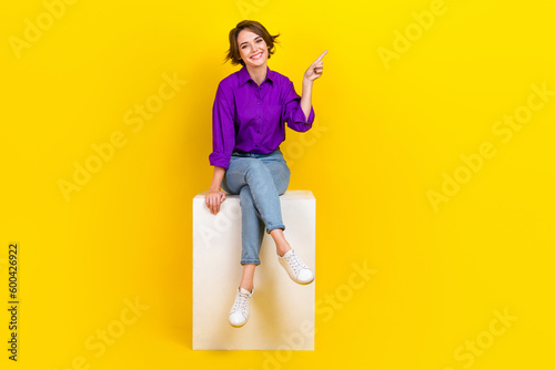 Fotobehang Full body size cadre of young satisfied business promoter lady sit podium point