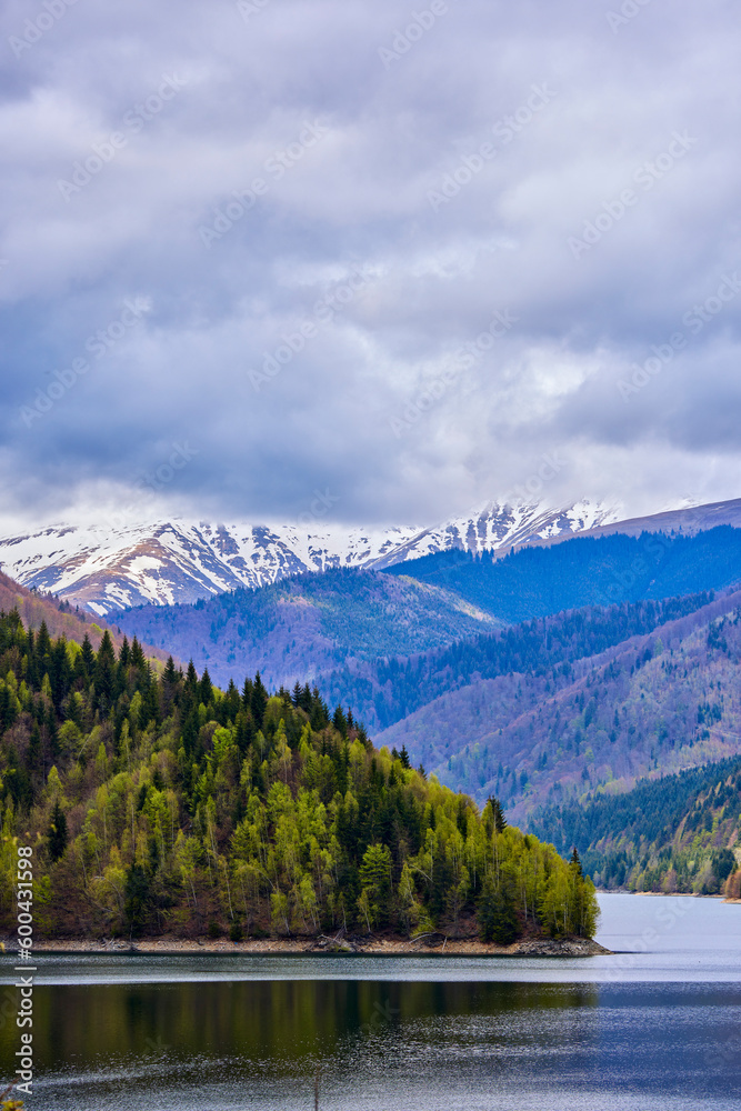 landscape with a lake and mountain in the Carpathian mountains of Romania