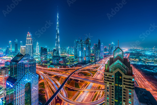 Fotografiet Burj Khalifa and High Rises on Sheikh Zayed Road at twilight, Downtown Dubai, Em