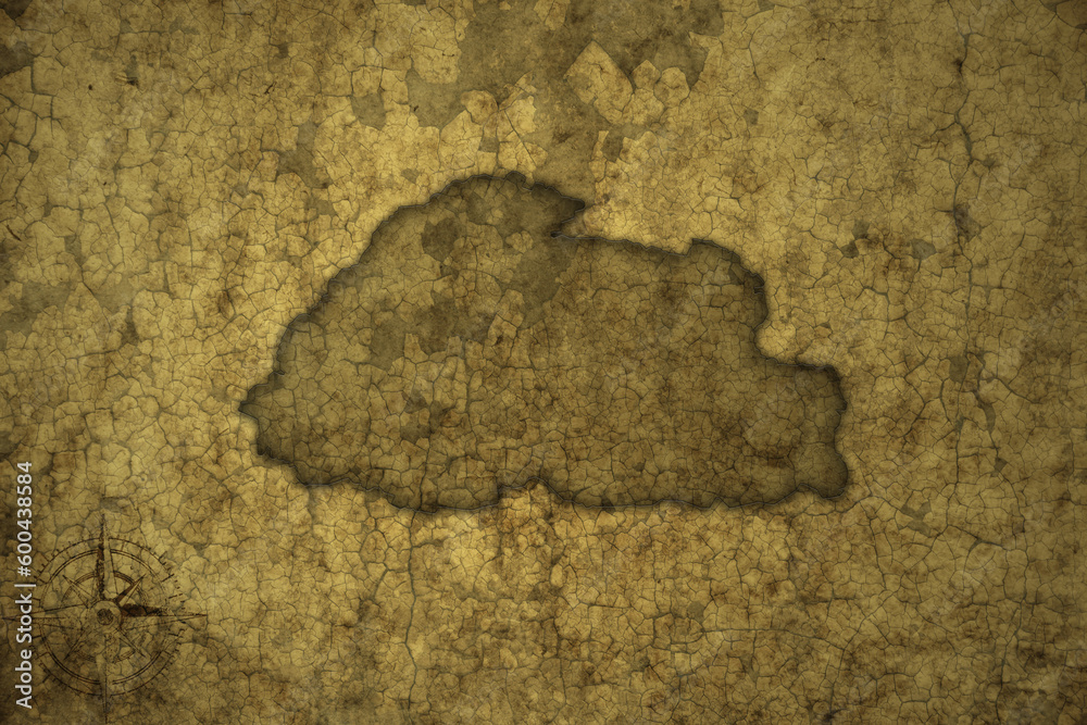 map of bhutan on a old vintage crack paper background .