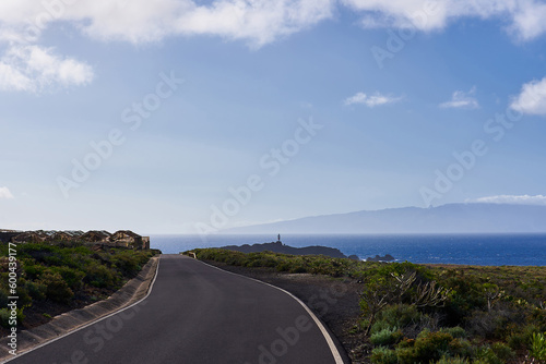 Landscape with a view of the lighthouse and the island in the fog. Tenerife Island