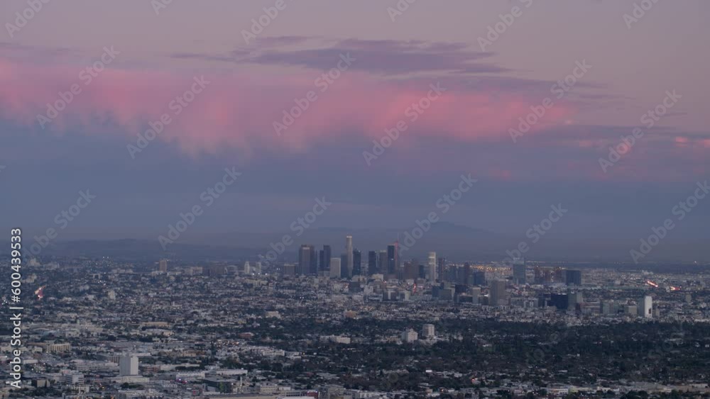 Aerial Panning Shot Of Cityscape Against Cloudy Sky At Dusk, Drone Flying Over Buildings - Los Angeles, California Aerial Panning Shot Of Cityscape Against Cloudy Sky At Dusk, Drone Flying Over Buildings - Los Angeles, California