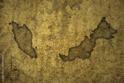 map of malaysia on a old vintage crack paper background .