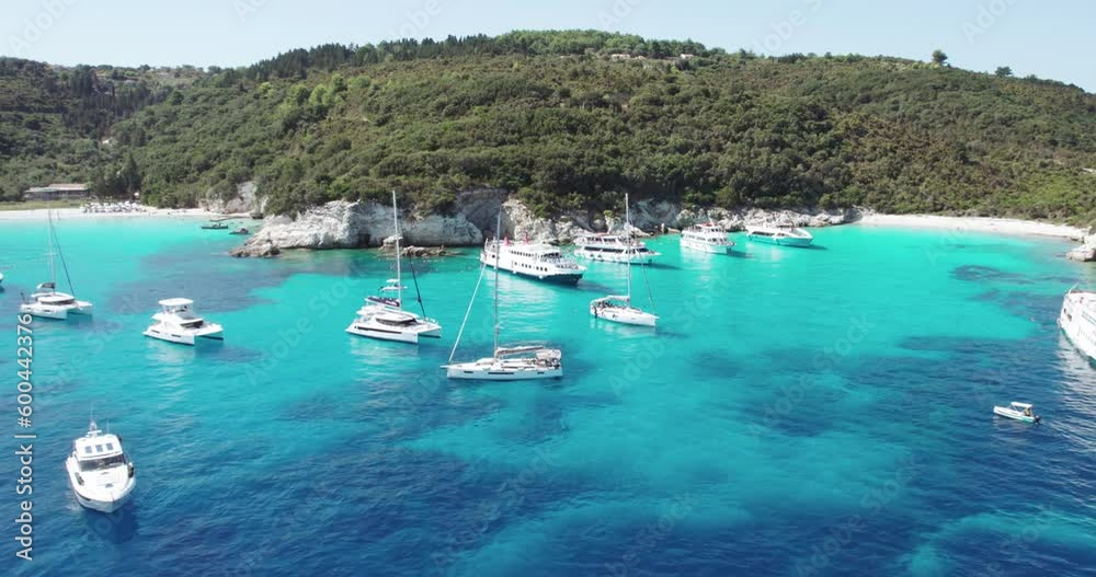 Aerial view of yacht boats achored at most beautiful beaches of Greece - Vrika in Antipaxos. Ionian islands Aerial view of yacht boats achored at most beautiful beaches of Greece - Vrika in Antipaxos. Ionian islands