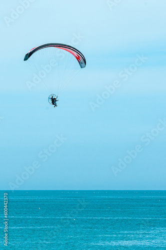Paragliding off Giulianova beach, italy, on sunny, April day