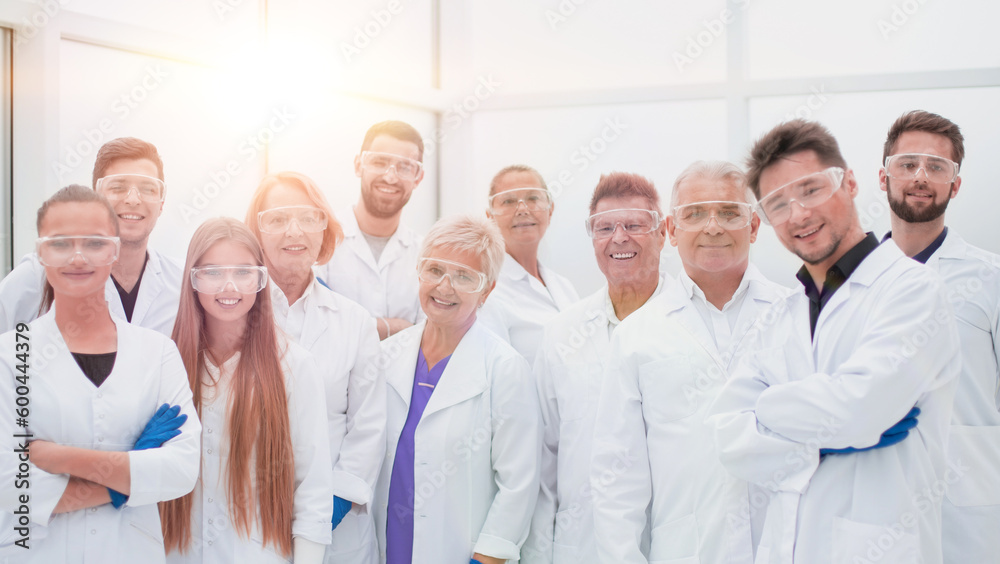 large group of medical researchers standing together large group of medical researchers standing together