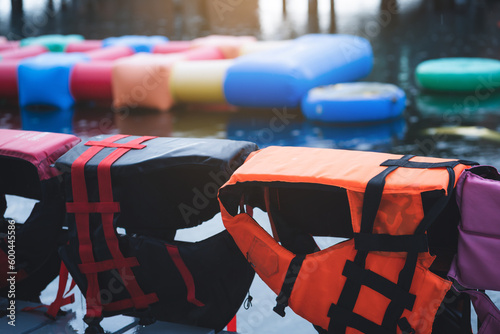 Life jackets by the pool or water amusement park.
