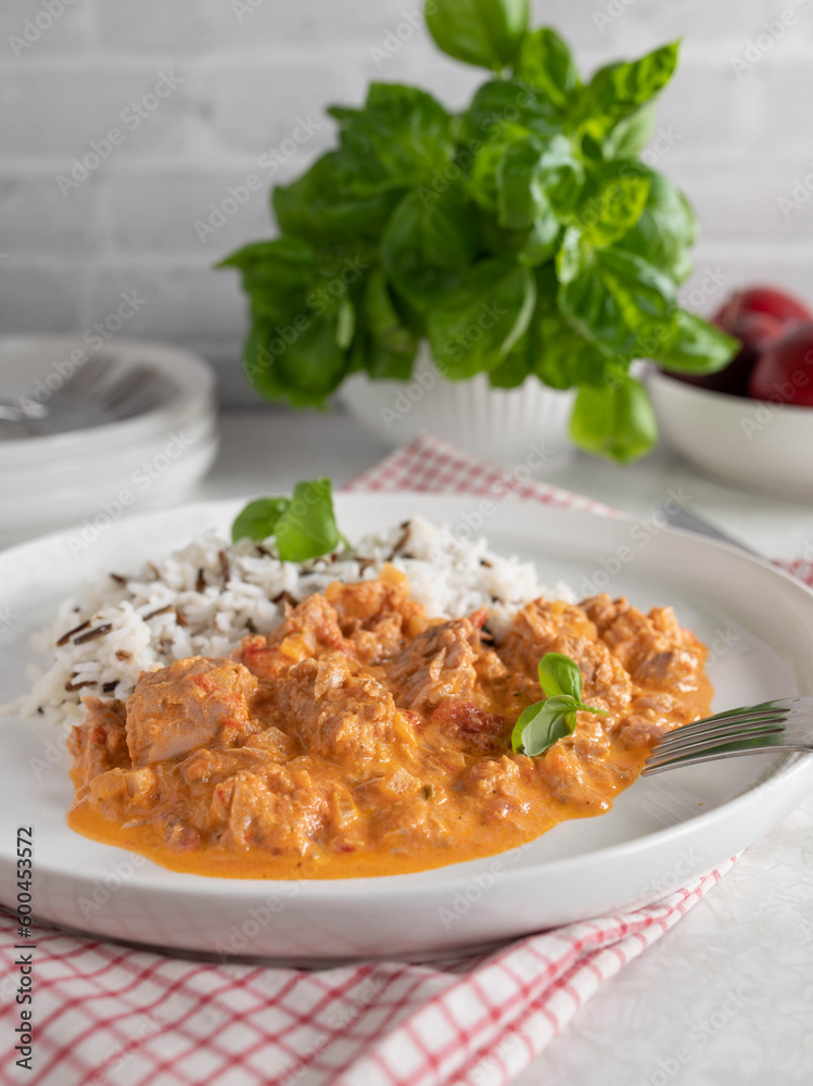 Basmati rice with wild rice and tuna sauce on a plate. Gluten free dish Basmati rice with wild rice and tuna sauce on a plate. Gluten free dish