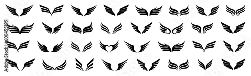 Set of black bird wing logo. Black wing symbol collection. Wing tattoo icons