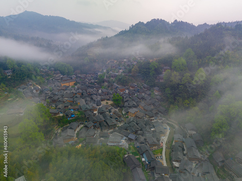 The old village under cloud sea. Dali Dong village in Rongjiang county, Guizhou, China. photo