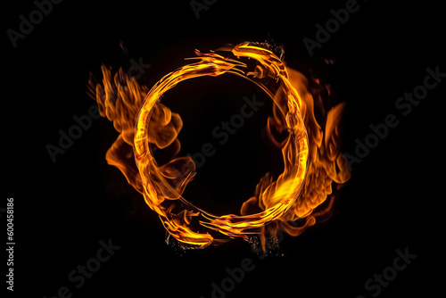 The hypnotic movement of a circular flame on a dark background. generative AI.